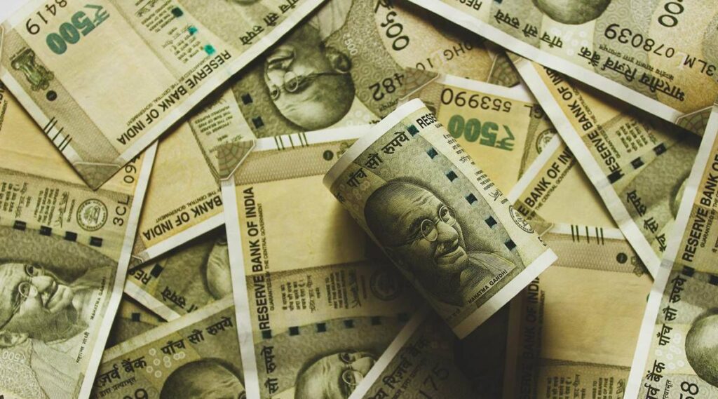 Rupee gains 9 paise against dollar on easing volatility