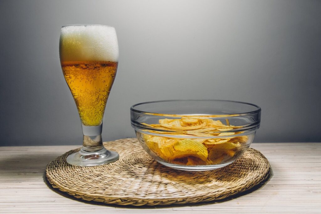 Why alcohol makes people reach for savory food and how that affects calorie intake