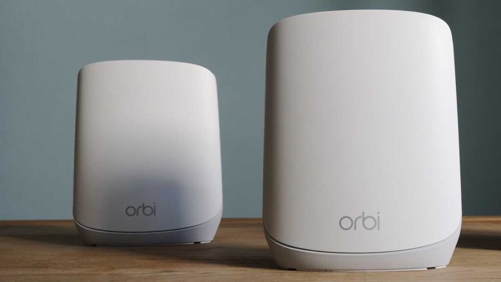 Netgear Orbi RBR760 router set up in a living room, connected to a modem