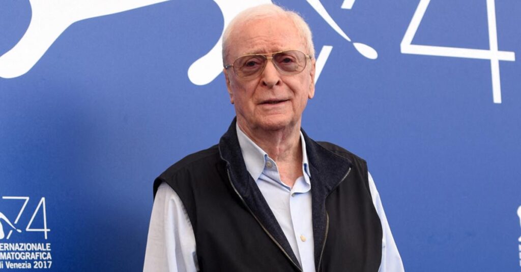 Walker-Bound Michael Caine, 90, Held Up by Pals After Date With Youthful Wife