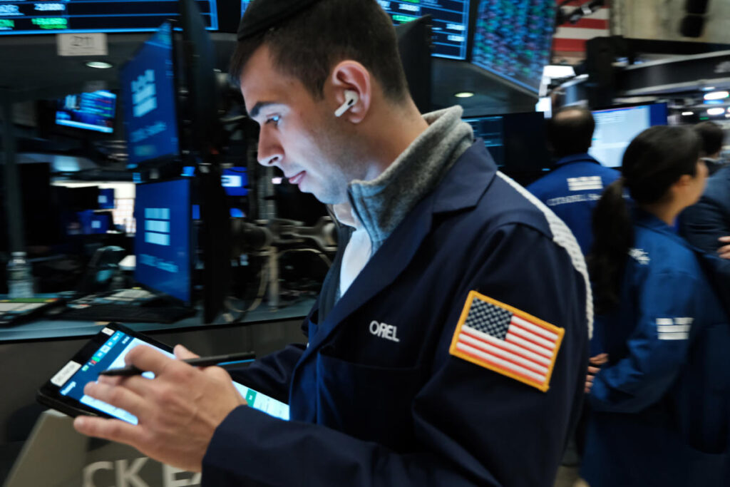 Stocks mixed while Nasdaq sinks amid new economic warnings: Stock market news today