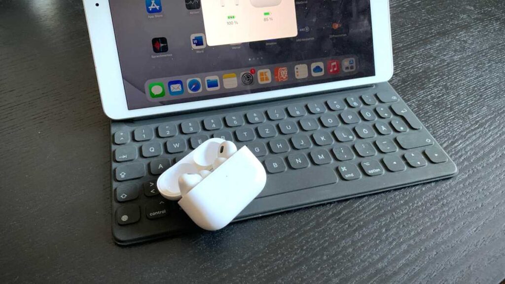 Close-up of AirPods Pro (2022) earbuds on a table