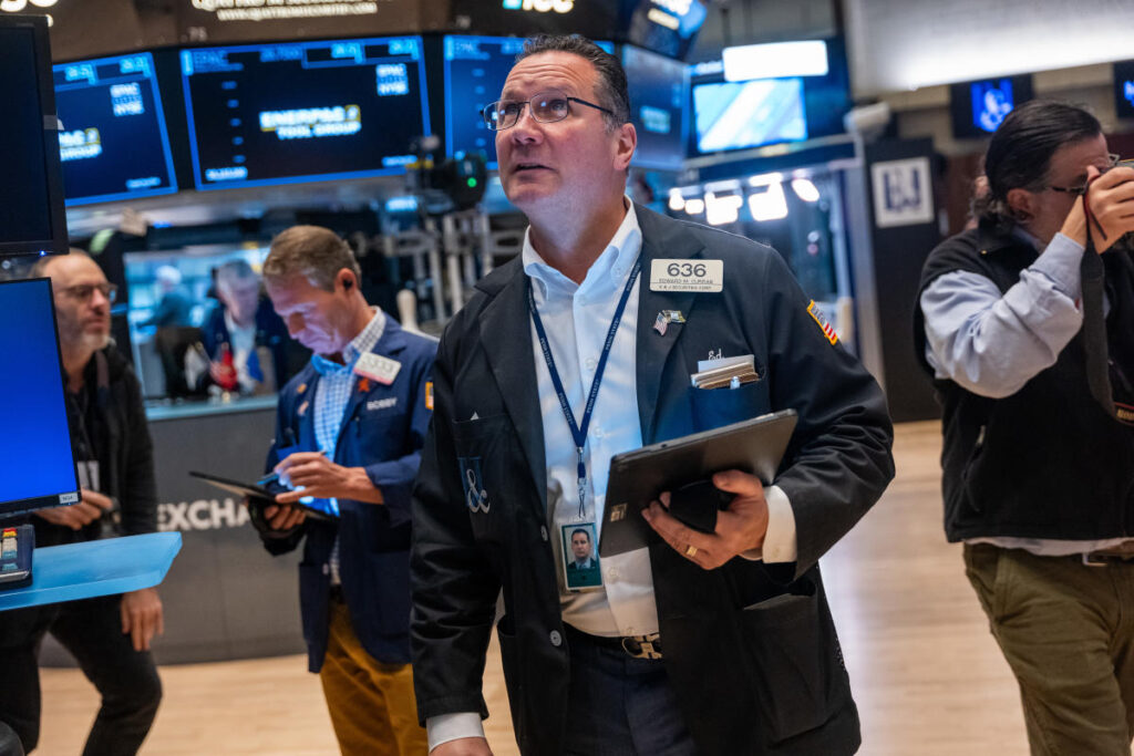 Dow, S&P 500 hit record highs as tech stocks soar