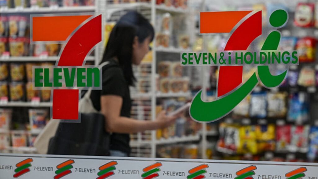 7-Eleven's parent company cuts full-year earnings forecast