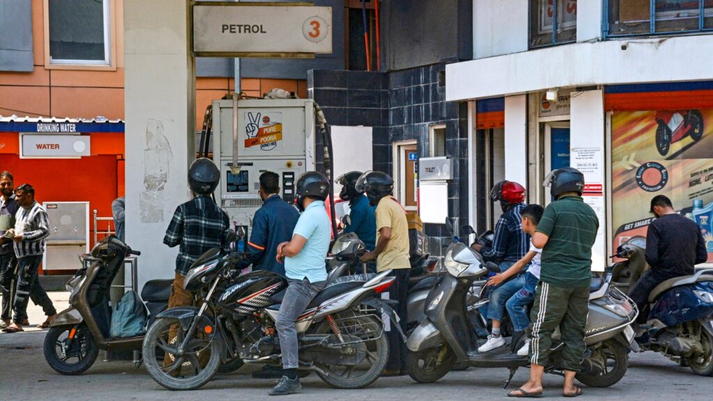 Commuters queue up to fill petrol in Srinagar
