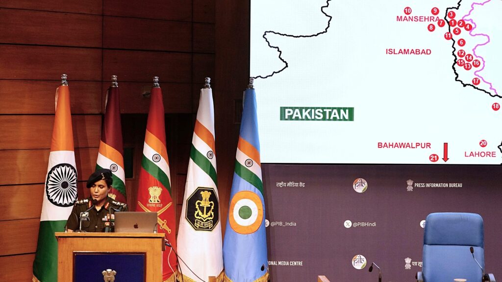 Colonel Sofiya Qureshi addresses a press conference after India struck multiple sites in Pakistan and Pakistan-occupied Kashmir (as seen on the map) under Operation Sindoor, in New Delhi on Wednesday