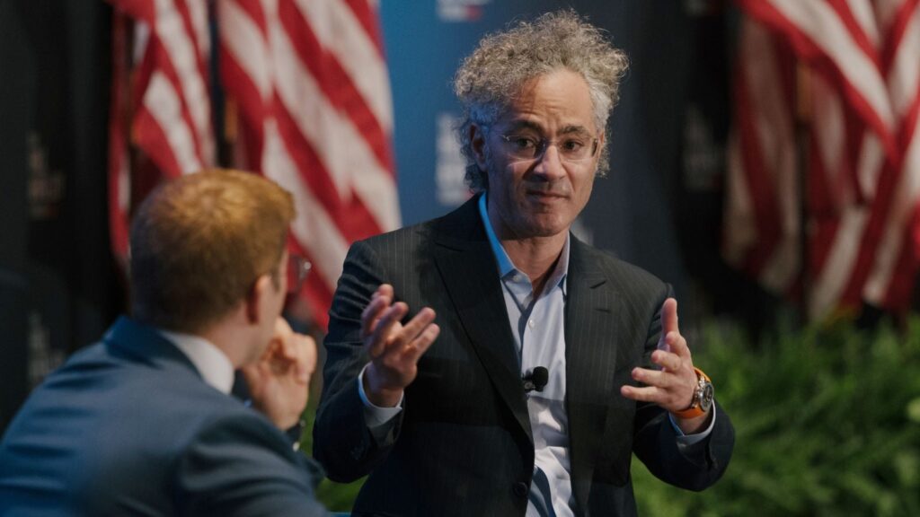 Alex Karp, co-founder and chief executive of Palantir Technologies, speaks during The Hill & Valley Forum in Washington, April 30, 2025. The Trump administration has expanded Palantir’s work with the government, spreading the company’s technology — which could easily merge data on Americans — throughout agencies. (Caroline Gutman/The New York Times)