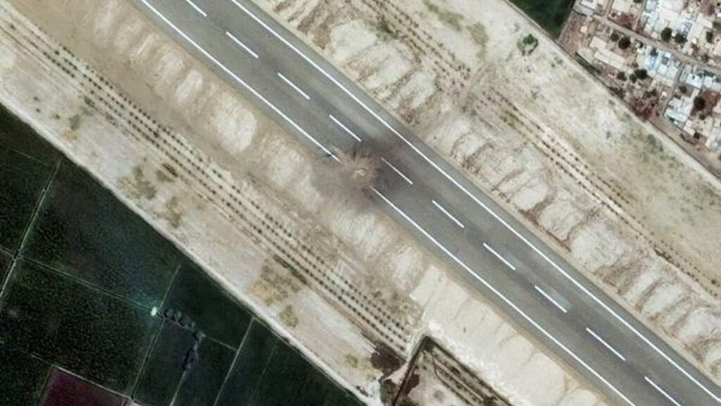 This satellite image provided by Maxar Technologies shows building and other damage at Rahim Yar Khan in Pakistan