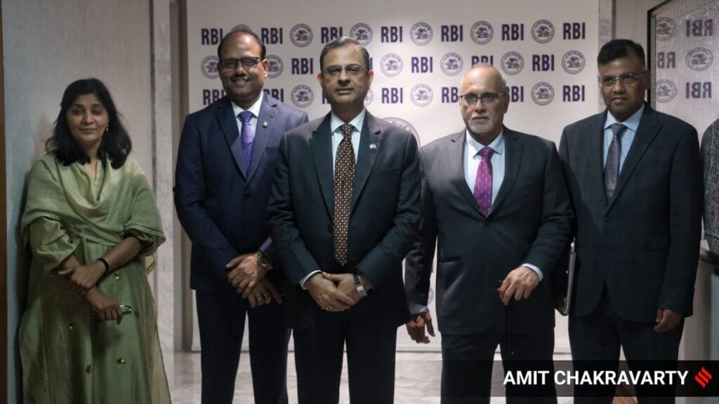 RBI Governor Sanjay Malhotra with the monetary policy committee ahead of the press conference in Mumbai on Wednesday.