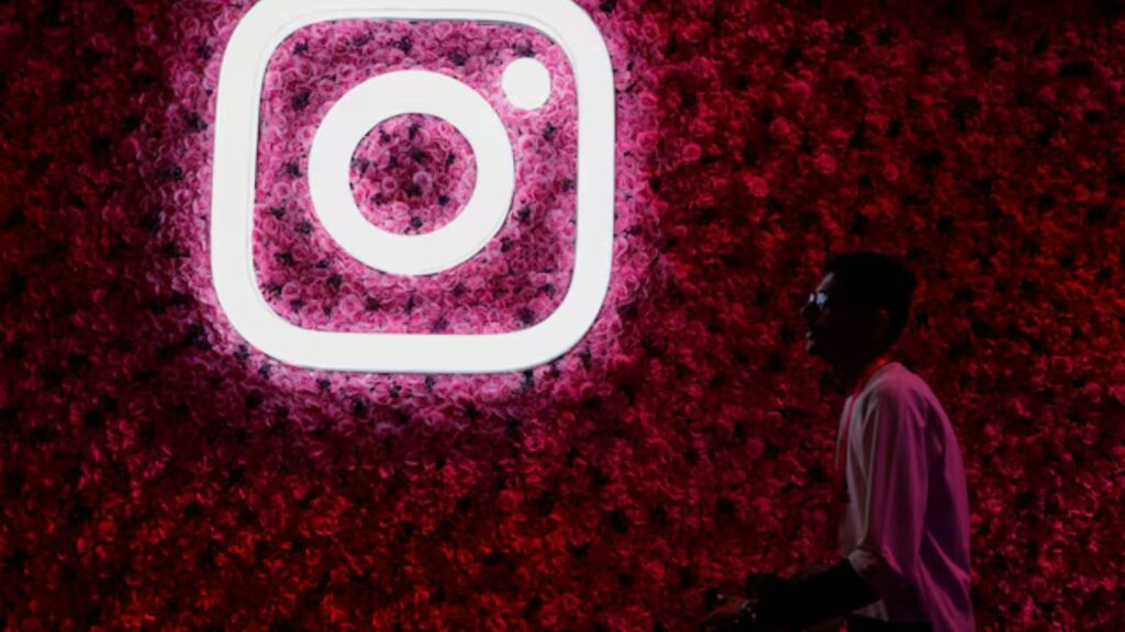 A man walks past a logo of the mobile application Instagram, during a conference in Mumbai, India, September 20, 2023. (File Photo: REUTERS/Francis Mascarenhas)