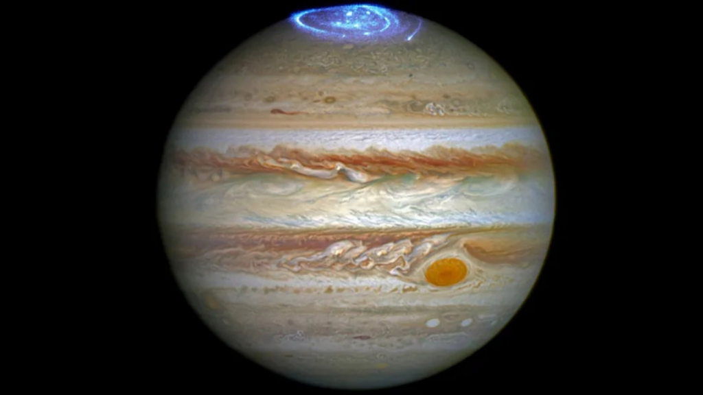 Jupiter saved Earth from spiralling into the Sun, scientists say | Technology News The image of Jupiter captured by the Hubble Space Telescope shows vivid auroras and the famous Great Red Spot. (Image credit: NASA, ESA, and J. Nichols (University of Leicester))