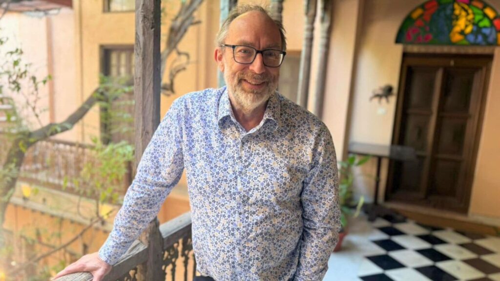 Wikipedia co-founder Jimmy Wales remains optimistic about the future of human-curated knowledge, even as AI-generated content spreads online. (Image: Bijin Jose/The Indian Express)