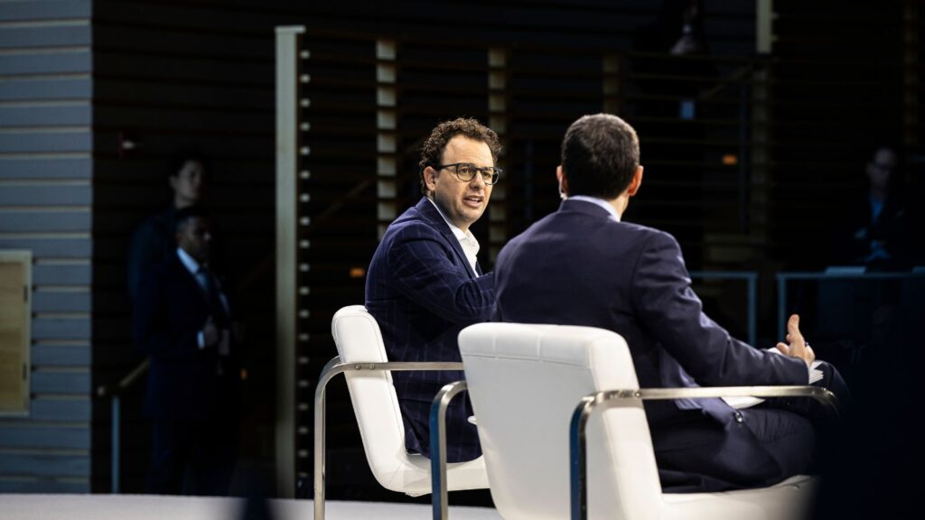 From left, Dario Amodei, CEO of Anthropic, talks with Andrew Ross Sorkin, financial columnist for the New York Times, during The New York Times Dealbook Summit in Manhattan, Dec. 3, 2025.