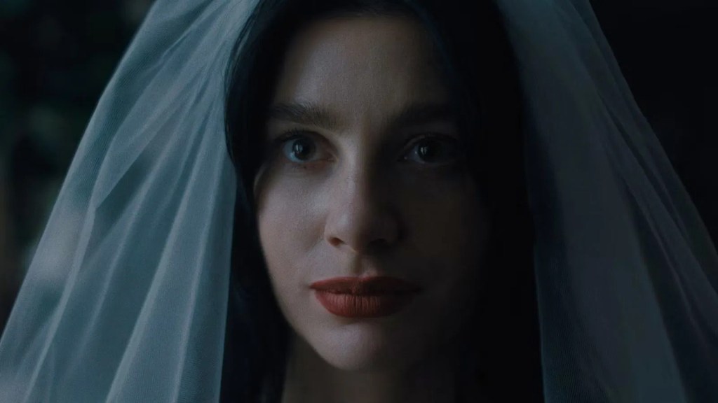 Something Very Bad Is Going To Happen Review: High-Quality Horror From Netflix Camila Morrone in Something Very Bad Is Going to Happen