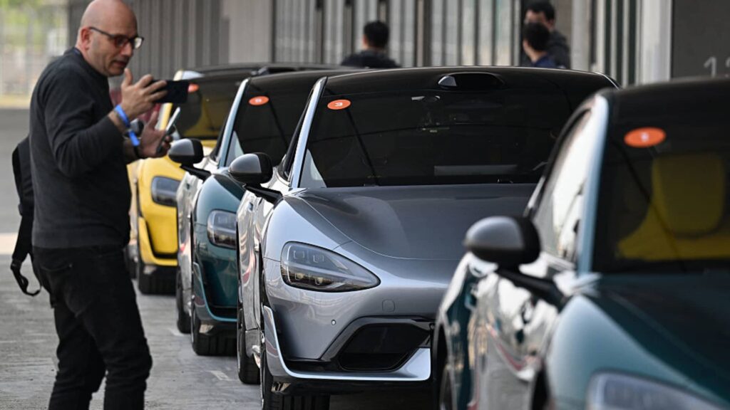 Foreign car companies use technology to hang onto China auto market Foreign car companies use technology to hang onto China auto market
